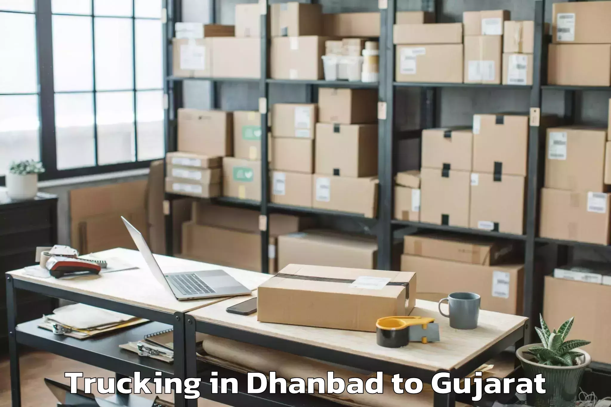 Easy Dhanbad to Bagasara Trucking Booking